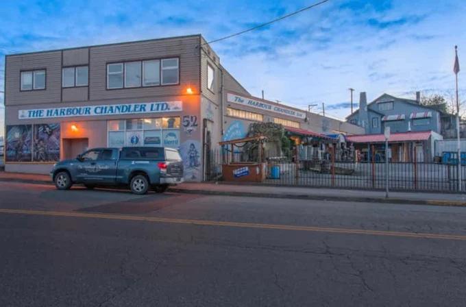 The Harbour Chandler flagship store on the Nanaimo waterfront, British Columbia, with marine-supply company truck parked out front.